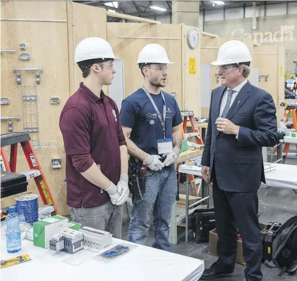  ?? SHAUGHN BUTTS ?? Alberta Education Minister David Eggen announced a new funding model to support dual-credit programs in Alberta while touring the 2017 Skills Canada Competitio­n at the Edmonton Expo Centre Wednesday.