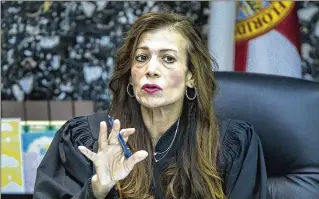  ?? LANNIS WATERS / THE PALM BEACH POST ?? At least three-quarters of the 188 attorneys who evaluated Circuit Judge Meenu Sasser gave her excellent ratings in nine evaluation areas included in the Palm Beach County Bar poll.