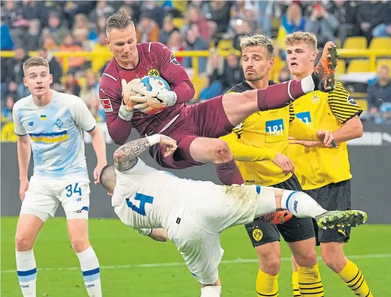  ?? ?? Borussia Dortmund keeper, Luca Unbehaun, makes a save against Dynamo Kyiv in the friendly the Ukrainians won 3-2