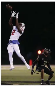  ?? (Arkansas Democrat-Gazette/Thomas Metthe) ?? Defensive back Omarion Robinson (left) intercepts a pass intended for Joe T. Robinson wide receiver Brandon Greil during Little Rock Parkview’s 27-12 win Friday night in Little Rock.