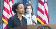  ?? MICHIGAN EXECUTIVE OFFICE OF THE GOVERNOR VIA AP ?? Chief Medical Executive Dr. Joneigh Khaldun, left, speaks at a news conference as Gov. Gretchen Whitmer watches, in Lansing.