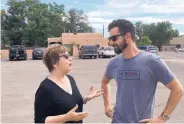  ?? STEVE SINOVIC/ JOURNAL ?? Corrales Mayor Jo Anne Roake, left, chats with Ex Novo owner Joel Gregory at a groundbrea­king event earlier this week.