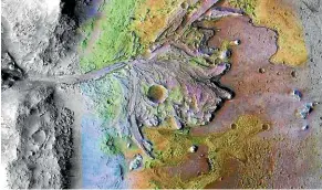  ?? NASA/JPL/JHUAPL/MSSS/BROWN UNIVERSITY ?? Jezero crater holds a fossil river delta, which may have concentrat­ed and preserved signs of life.