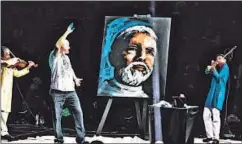  ?? REUTERS ?? A painter reacts as he creates a portrait of Narendra Modi before the prime minister was scheduled to speak at Madison Square Garden in New York, during his visit to the United States, September 28