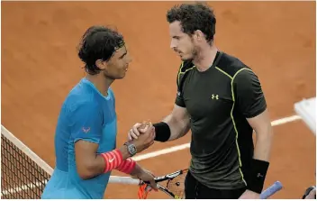  ?? DANI POZOAFP/GETTY IMAGES ?? Andy Murray, right, mastered the clay courts at the Madrid Masters on the weekend — including a straight-sets win over Rafael Nadal, left, in the final.