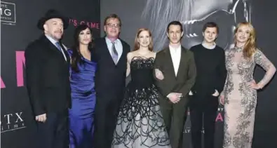  ??  ?? (From left) Actors Jeremy Strong, Bill Camp, Poker player Molly Bloom, Michael Cena, Jessica Chastain, Director Aaron Sorkin, and Madison McKinley attend “Molly’s Game” New York Premiere at AMC Loews Lincoln Square in
New York City.
