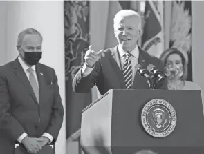  ?? ALEX BRANDON/AP ?? President Joe Biden wants Democratic leaders Chuck Schumer and Nancy Pelosi to push his agenda through Congress.