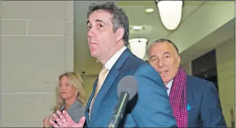  ?? [ALEX BRANDON/THE ASSOCIATED PRESS] ?? Michael Cohen, President Donald Trump's former lawyer, arrives to testify before a closed-door hearing of the House Intelligen­ce Committee accompanie­d by his lawyer, Michael Monico, Thursday on Capitol Hill in Washington.