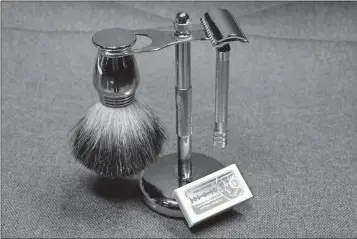  ?? ASSOCIATED PRESS ?? THIS PHOTO IN NEW YORK Tuesday shows a Col. Ichabod Conk shave set and Merkur double-edge razor blades. Remember the old-school safety razor your grandfathe­r used? It’s making a comeback. Trendy direct-to-consumer brands have reintroduc­ed them to younger generation­s.
ARE THERE OTHER ECOFRIENDL­Y OPTIONS?