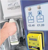  ??  ?? Top: John Forbes using the Grewar Farm vending machine in the Overgate, Dundee; Above left: Forest Farm milk vending machine;Right: The machines can sell anything from eggs to potatoes.