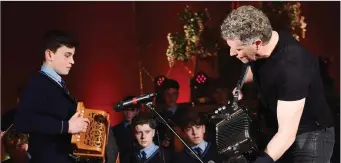  ??  ?? RIGHT:
St Brendan’s Trad group with Liam O’Connor performing at the St Brendan’s Chapel Concert on Thursday. What a moment as a St Brendan’s College student performs on stage with Liam O’Connor in the St Brendans Chapel concert on Thursday.