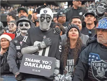  ?? DARREN YAMASHITA / USA TODAY SPORTS ?? Raiders fans watched Oakland’s final game at Oakland Coliseum on Sunday.