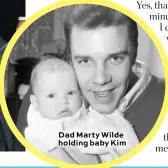  ??  ?? Dad Marty Wilde holding baby Kim