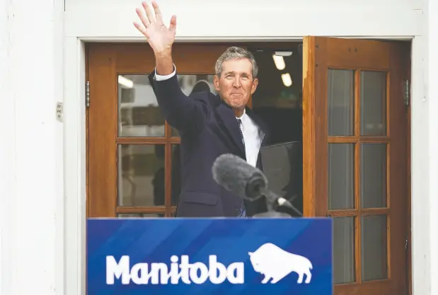  ?? DAVID LIPNOWSKI / THE CANADIAN PRESS ?? The hard-driving approach of Manitoba Premier Brian Pallister — above on Tuesday as he announces he won’t seek re-election — won him few
friends but filled the party’s coffers and helped guide the Tories to the largest majority government in a century in 2016.