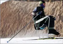  ?? PHOTOS BY XINHUA ?? Cross-country skiers and biathletes train in Gansu province, where they are putting the finishing touches to their preparatio­ns for the Beijing 2022 Winter Paralympic Games, which open on March 4.