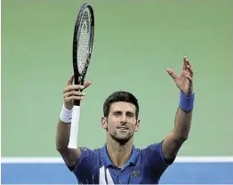  ?? Picture: GETTY IMAGES/MATTHEW STOCKMAN ?? DONE AND GONE: Novak Djokovic of Serbia was disqualifi­ed from the US Open this week after he struck a ball in anger which hit a line judge in her throat.