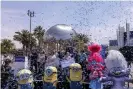  ?? HW Chiu/AP ?? California’s governor, Gavin Newsom, celebrates with other guests after the Vax for the Win lottery contest. Photograph: Ringo