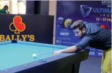  ??  ?? Aamer Javeed lines up a shot during his match at the 10 Ball Pool India Open championsh­ip at the Hyderabad Next Galleria Mall in Hyderabad.