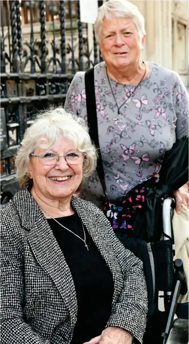  ?? ?? Overwhelme­d: June Allen-Westbrook, front, and Janice Cook after leaving the hall