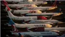  ??  ?? Самолеты Boeing 737 Max разных авиакомпан­ий, простаиваю­щие из-за запрета на полеты