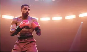  ?? MGM ?? Michael B. Jordan returns as Adonis Creed in “Creed III.” The latest film in the franchise is also Jordan’s directoria­l debut.