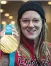  ?? The Canadian Press ?? See what nice teeth Olympic gold medallist Cassie Sharpe has.That’s because she wears a mouthguard when she competes in ski halfpipe.