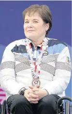  ??  ?? Curling Aileen Neilson (46), from Strathaven, received £5000