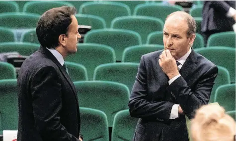  ?? PHOTO: MAXWELLS ?? Close ties: Leo Varadkar (left) talks with Micheál Martin inside the Convention Centre in Dublin.