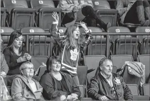  ?? NEWFOUNDLA­ND GROWLERS PHOTO/JEFF PARSONS ?? There were only 2,709 fans out for Wednesday’s Newfoundla­nd Growlers’ 5-2 win over the Worcester Railers, but that didn’t deter this young fan from enjoying herself at the game.