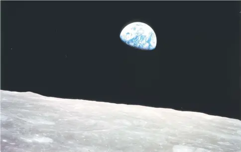  ??  ?? This file picture shows the Earthrise over the moon made on Dec 24, 1968 from Apollo 8, the first manned mission to the moon, as it entered lunar orbit. — AFP photo