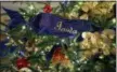  ?? CAROLYN KASTER — THE ASSOCIATED PRESS ?? A detail of the official White House Christmas tree is seen in the Blue Room during the 2018 Christmas Press Preview at the White House in Washington, Monday.