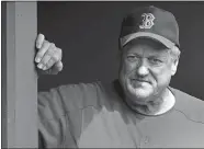  ?? CHARLES KRUPA/AP FILE PHOTO ?? In this 2003 file photo, Boston Red Sox pitching coach Tony Cloninger watches batting practice from the dugout prior to the team’s baseball game against the Minnesota Twins in Fort Myers, Fla. Cloninger, perhaps best known for hitting two grand slams in a game, has died. He was 77. He had worked as a consultant for the Red Sox since 2002.