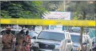  ?? Picture: AFP ?? TIGHT SECURITY: Burkinabe police investigat­e an area around a popular Ouagadougo­u restaurant after an attack