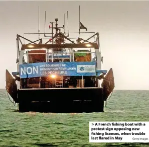  ?? Getty Images ?? A French fishing boat with a protest sign opposing new fishing licences, when trouble last flared in May