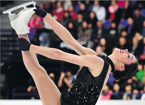  ?? — GETTY IMAGES ?? Kaetlyn Osmond performs in the ladies short program Wednesday at the world figure skating championsh­ips in Helsinki. Osmond has a chance to capture Canada’s first medal in women’s singles competitio­n at the worlds since 2009.