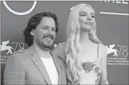  ?? Filippo monteforte/aFp via Getty Images/tns ?? Director Edgar Wright and actress Anya Taylor-Joy attend a photocall for the film “Last Night in Soho” presented out of competitio­n on Sept. 4, during the 78th Venice Film Festival at Venice Lido.