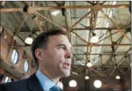  ?? FRANK GUNN — THE CANADIAN PRESS VIA AP ?? Federal Finance minister Bill Morneau is framed by structural steel framing as he speaks after an event in Toronto on Monday. Morneau says Canada should be exempted from the aluminum and steel tariffs U.S. President Donald Trump is weighing.