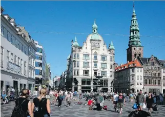  ?? PHOTOS: RICK STEVES ?? Take a stroll along the Strøget, a series of lively streets and inviting squares that stretches through the old town in Copenhagen.