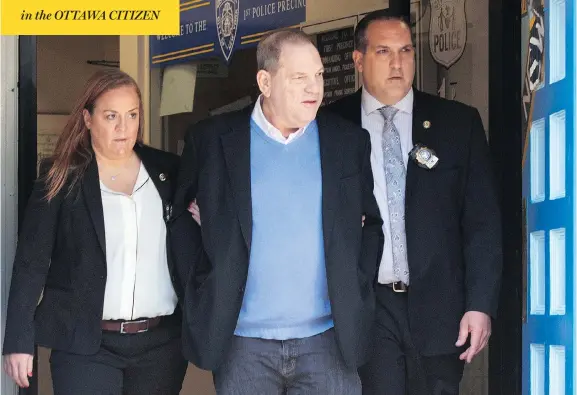  ?? BRYAN R. SMITH / AFP / GETTY IMAGES ?? Movie mogul Harvey Weinstein, pictured leaving a New York police station on Friday, has been charged with rape and other sex crimes involving two separate women.