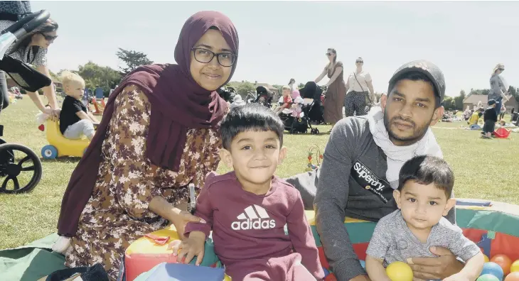  ?? ?? Hafsa Mansoor and Rafi Abdeen from Hilsea, with their children (left) Aabid Rafi (2) and Ayman Rafi (1). Picture: Sarah Standing