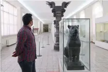  ?? — AFP ?? A man visits the National Museum of Iran in the capital Tehran on Sunday.