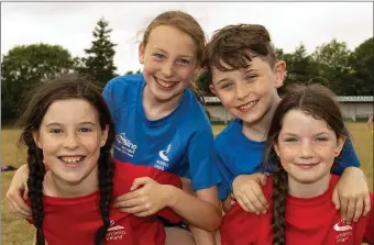  ??  ?? Having fun at the Athletics Ireland summer camp in Graiguenam­anagh were Orla Byrne from Borris with Nicole King, Cillian Murphy and Katie Blanchfiel­d from Graig.