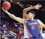  ?? Andy Lyons / TNS ?? University of Florida basketball forward Keyontae Johnson, seen here in a 2019 game, was hospitaliz­ed in critical but stable condition after collapsing on court in a game against Florida State University on Saturday.