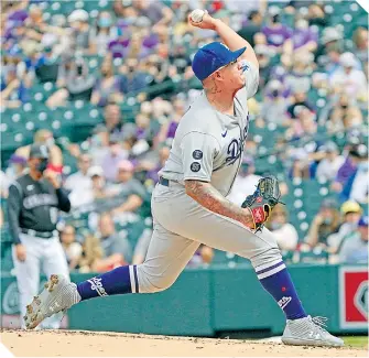  ?? / FOTO: REUTERS ?? Julio obtuvo la primera victoria en su carrera ante los Rockies.