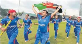  ?? TWITTER ?? Afghanista­n U19 players celebrate winning the Asia Cup in Kuala Lumpur on Sunday.