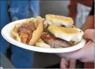  ?? FILE PHOTO ?? In this file photo, hot dog and sliders hot off the grill from Jack’s Drive In.