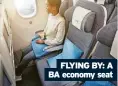  ?? ?? FLYING BY: A BA economy seat