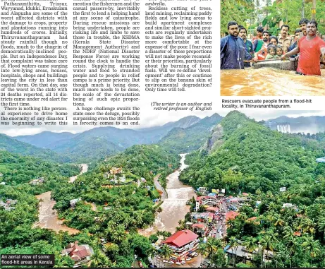  ??  ?? An aerial view of some flood-hit areas in Kerala