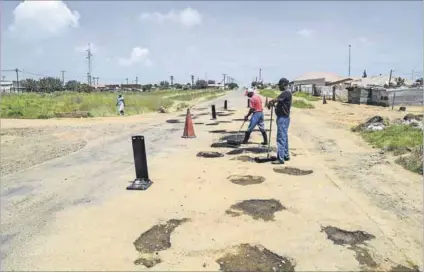  ??  ?? Barely navigable: Bethlehem’s roads are beset by potholes, despite the fact that the municipali­ty has paid more than R4.6-million for asphalt over the past couple of years