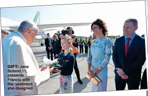  ??  ?? gift: Jane Boland,11, presents Francis with the vestment she designed